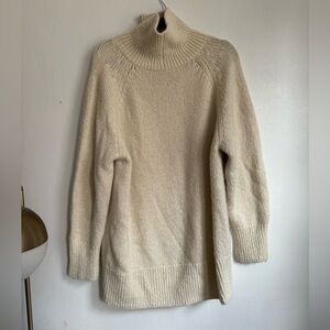 Aritzia. Cream turtle-neck sweater. 100% Alpaca. Comfortable fit.